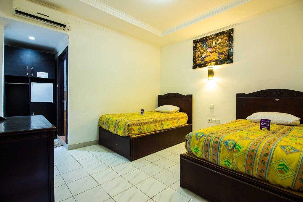 Hotel Sanjaya Managed By Tinggal Кута Екстериор снимка