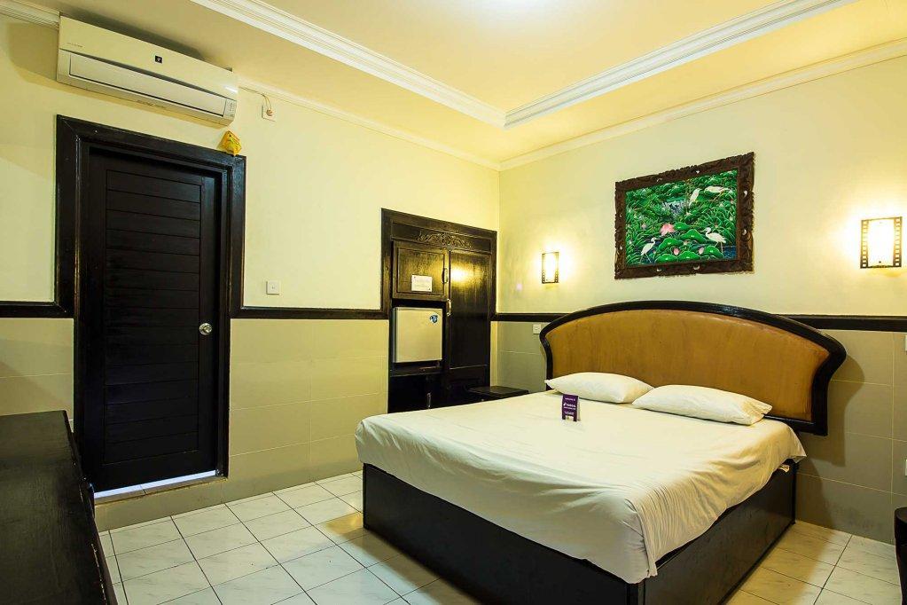 Hotel Sanjaya Managed By Tinggal Кута Екстериор снимка